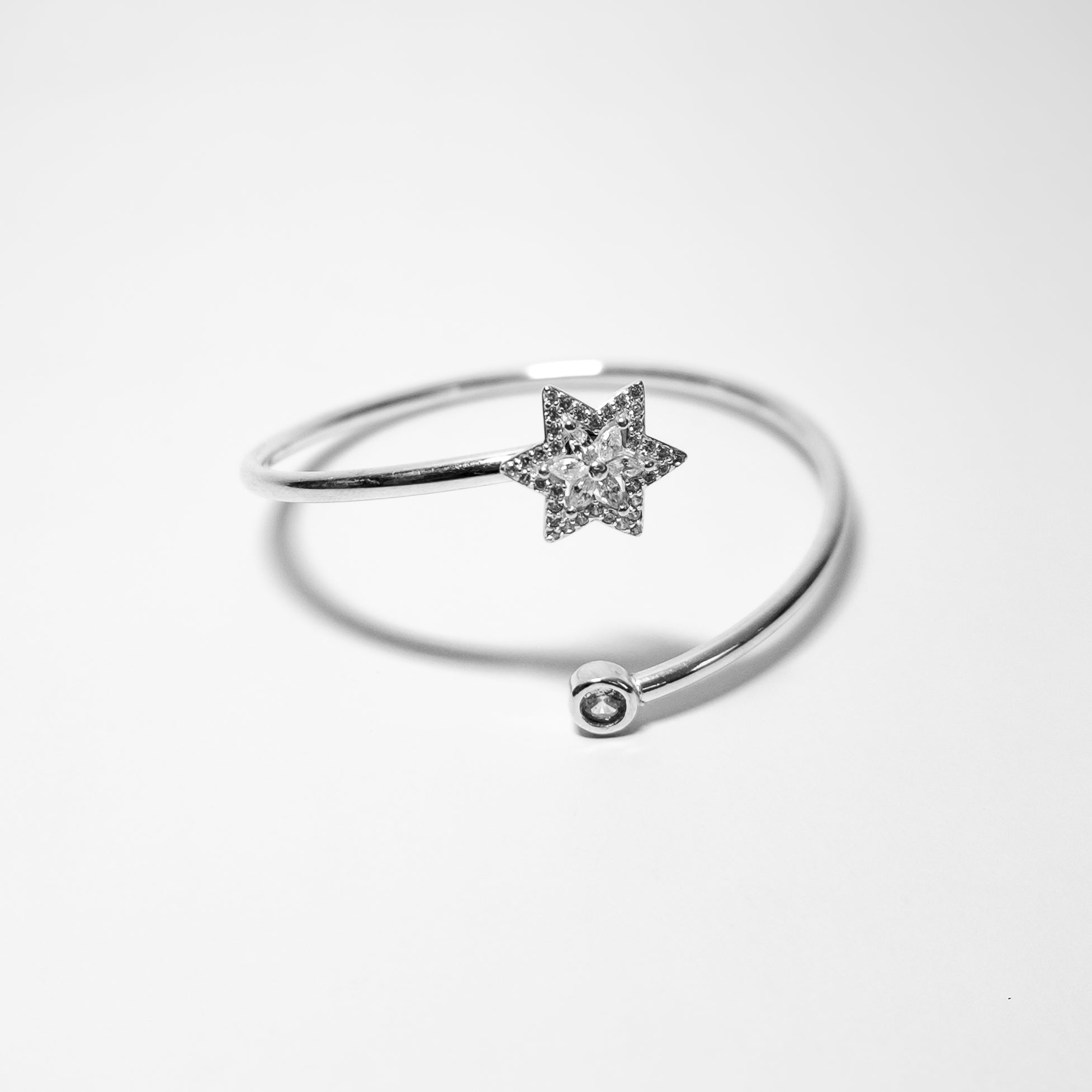 Pulsera estrella giratoria