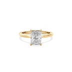 Radiant solitaire with elevated shoulders gold