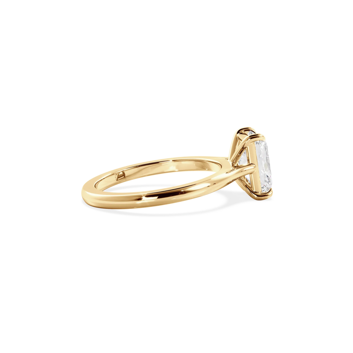 Radiant solitaire with elevated shoulders gold