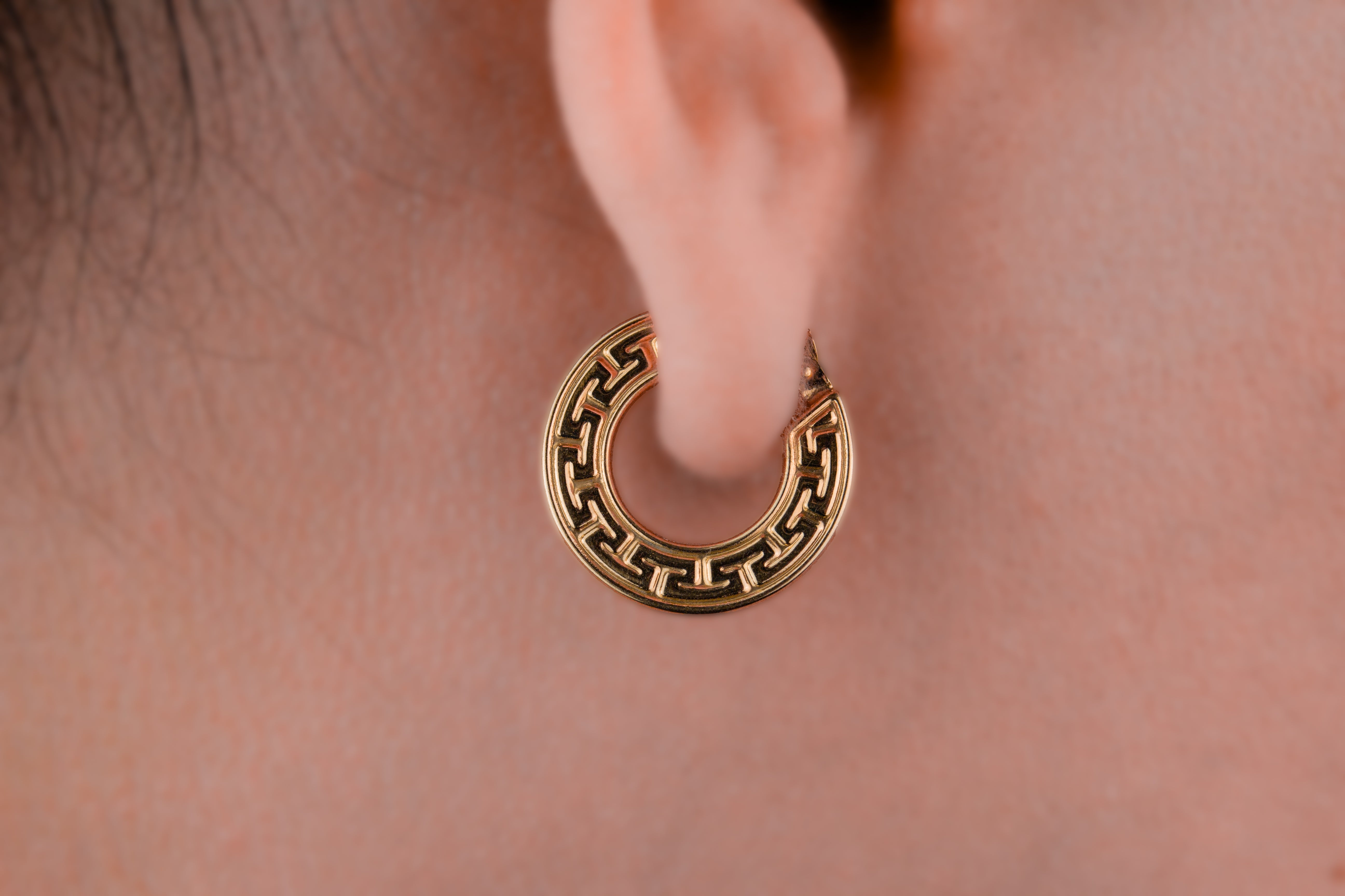 Argolla Versache labrada